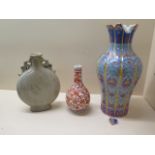 A Chinese crackle glaze moon vase, 17cm tall, and a smaller bottle vase, both good condition and