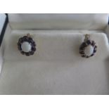 A good pair of antique opal and gold earrings, not hallmarked but tests to approx 9ct with higher