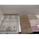 Five unframed needlework samplers, largest 45cm x 35cm, largest has holes to border and some moth
