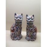 A pair of modern Imari style smiling cats, 35cm tall, both good