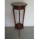 An Edwardian inlaid mahogany plant stand, 95cm tall x 33cm diameter top