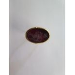 A Roman figure intaglio in a yellow gold ring mount, size U, tests to approx 18ct, approx 3.7 grams