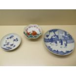 A Chinese blue and white dish, 20cm diameter, a bamboo decorated saucer and a carp decorated
