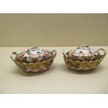 A pair of Spode 1645 pattern lidded pot pourri, 11cm long, repair to one lid handle and crack to one