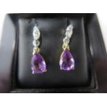 A pair of 18ct yellow and white gold amethyst and marquise cut diamond drop earrings, 2cm drop, in