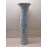 A Chinese early 20th century arrow vase with carved decoration of lotus panels and chrysanthemum