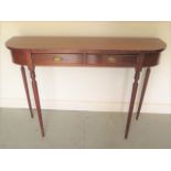 A new D shaped two drawer hall table on turned legs, made by a local craftsman to a high standard,