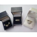 Two 9ct yellow gold diamond rings, a 9ct yellow gold diamond ring with matching earrings, size N,O,