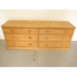 A pine 6 drawer long chest, 69cm tall x 173cm x 44cm, in good condition