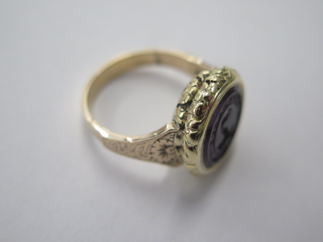A Georgian / Victorian (9ct gold tested) amethyst intaglio seal ring, reshanked, size S, approx 10 - Image 2 of 3