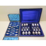 Two boxed sets of 12 silver teaspoons and nips, total weight approx 16.8 troy oz
