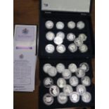 A collection of 32 silver Diamond Wedding coins, approx 900 grams
