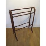 A beechwood towel rail, 90cm tall x 67cm