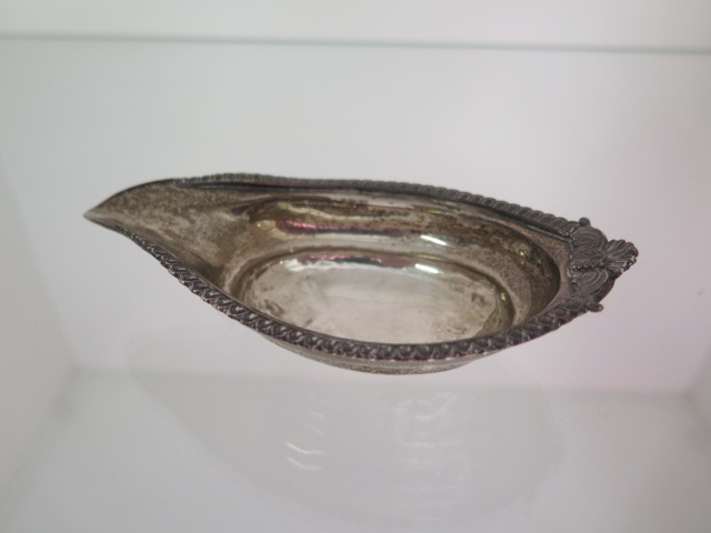 A silver pap boat London George III, 13cm long, some denting / wear, approx 1.5 troy oz