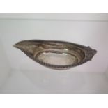 A silver pap boat London George III, 13cm long, some denting / wear, approx 1.5 troy oz