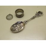 A Dutch silver 835 silver spoon, 19cm long, a silver serviette ring, total approx 2.6 troy oz and
