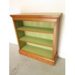 A new burr oak bookcase with two adjustable shelves and painted interior, made by a local