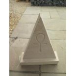 A limestone Egyptian pyramid design garden sculpture, made by a Cambridgeshire stone mason, 65cm