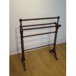 A mahogany barley twist towel rail, 84cm tall x 68cm wide in clean condition