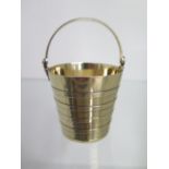 A George III silver cream pail, London 1767/68 WP William Plummer, 7cm tall with handle down, approx