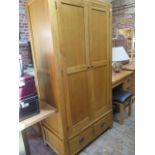 A oak double wardrobe with 2 base drawers, 103cm wide x 195cm tall