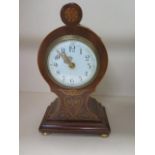 An 8 day walnut case with floral inlay French movement mantle clock, 26cm tall, in running order