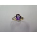 A hallmarked 9ct yellow gold amethyst and diamond ring, size O, approx 2.5 grams, good condition
