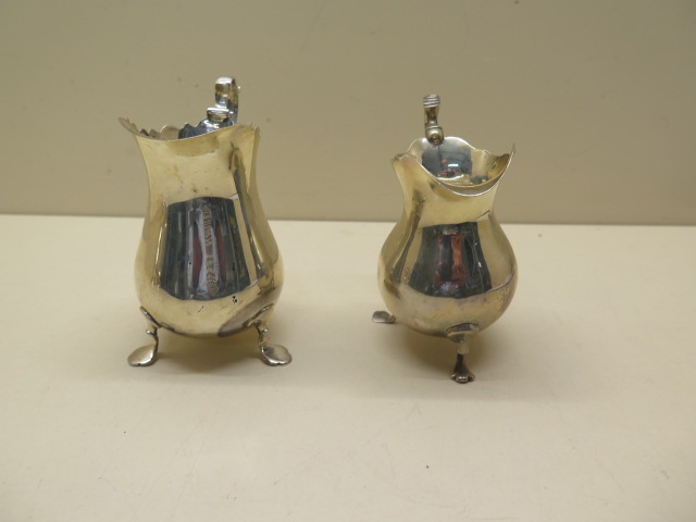 Two silver cream jugs, tallest 10cm, total weight approx 6.1 troy oz, denting to smaller jug and - Image 3 of 9