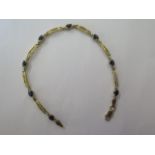 A 10ct yellow gold sapphire bracelet, 18cm long, approx 3.4 grams, in good condition