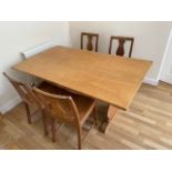 An oak dining table and 4 chairs, 160cm long x 91cm wide x 70cm high