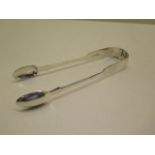 A pair of fiddle pattern sugar tongs, 14 cm long, London 1859 HH Harry Hyams, approx 1.2 troy oz