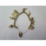 A 9ct yellow gold charm bracelet with 9 charms, approx 29 grams