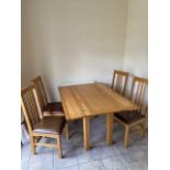 An oak foldover dining table and 4 matching dining chairs, 133cm x 50cm, folds over to make it 100cm