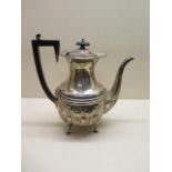 A silver teapot, 23cm tall, Birmingham 1908/09, approx 24.3 troy oz, engraved, generally good