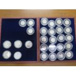 A collection of 23 silver proof 50 pence 2011 Olympic coins each 8 grams and 5 2012 £5 silver
