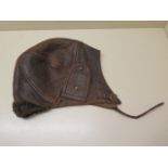An early 1900's leather flying helmet, some general wear but reasonably good