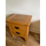 An oak bedside chest