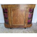 A Victorian burr walnut line inlaid ormulu mounted side cabinet with a central door flanked by