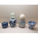 Four pieces of blue and white Oriental china, an Ostrich egg and a glass float, tallest vase