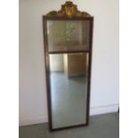 A decorative mahogany and gilt hall mirror with bevel edge mirror and French coloured print, 142cm