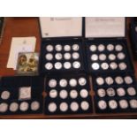 A collection of 54 Trafalgar Bicentenery silver coins, approx 1.520 kgs and a crown