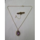 A 15ct pendant 2cm x 3cm, on a 9ct chain 46cm long and a 9ct bar brooch, total weight approx 13