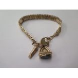 A 9ct gold gatelink bracelet with whistle and fob, total weight approx 24.8 grams, missing safety