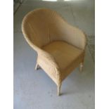 A painted Lloyd loom chair