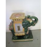 A Chinese ceramic Elephant garden stool, 55cm tall x 55cm long, minor chips to base otherwise