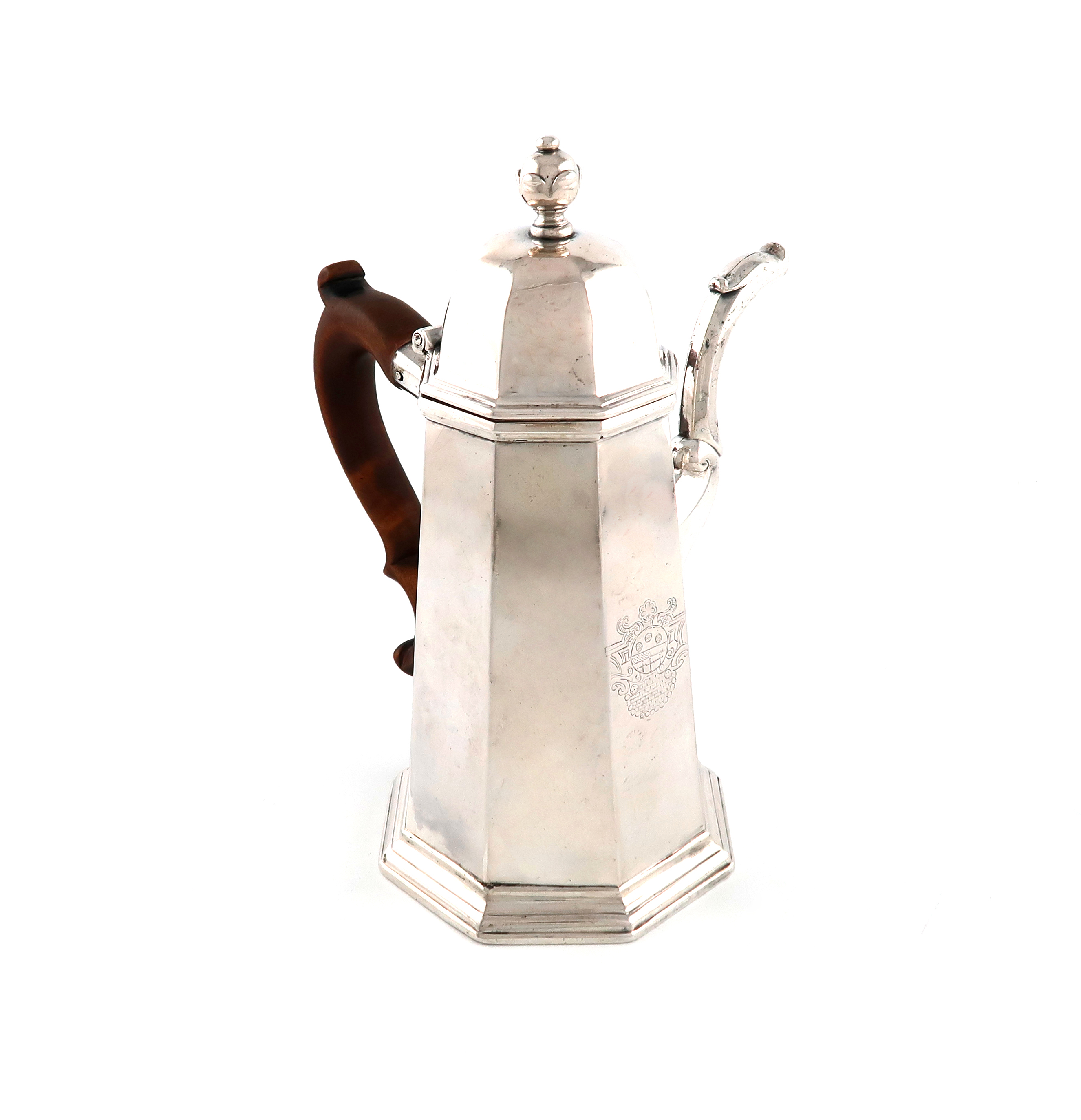 A George I silver coffee pot, by John Chartier, London 1716, tapering octagonal form, faceted spout,