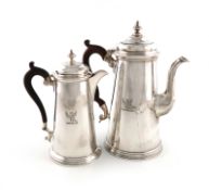An Edwardian silver coffee pot and a similar hot water pot, by D and J Wellby, London 1904, the