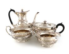 A four-piece Edwardian silver tea and coffee set, over stamped with maker's mark of Gibson and Co.
