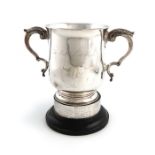 A late-Victorian silver two-handled trophy cup, by Aldewinckle and Slater, London 1889, circular