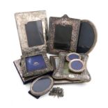 A large collection of silver photograph frames, various dates and makers, including a rectangular